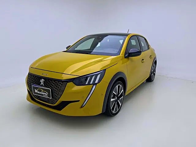 Foto de um peugeot e-208 208 e-gt elétrico: conectando o futuro ao presente.