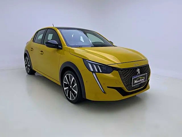 Foto de um peugeot e-208 208 e-gt: o futuro do design e sustentabilidade em um só carro.