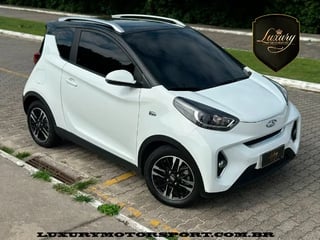 Foto de um chery icar caoa cherry  eq1 tec 2023 branco.