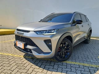 Foto de um chana cargo gwm haval h6 gt phev awd.