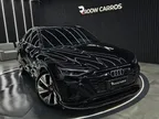 Foto de um audi q8 e-tron.