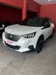 Foto de um peugeot e-2008.